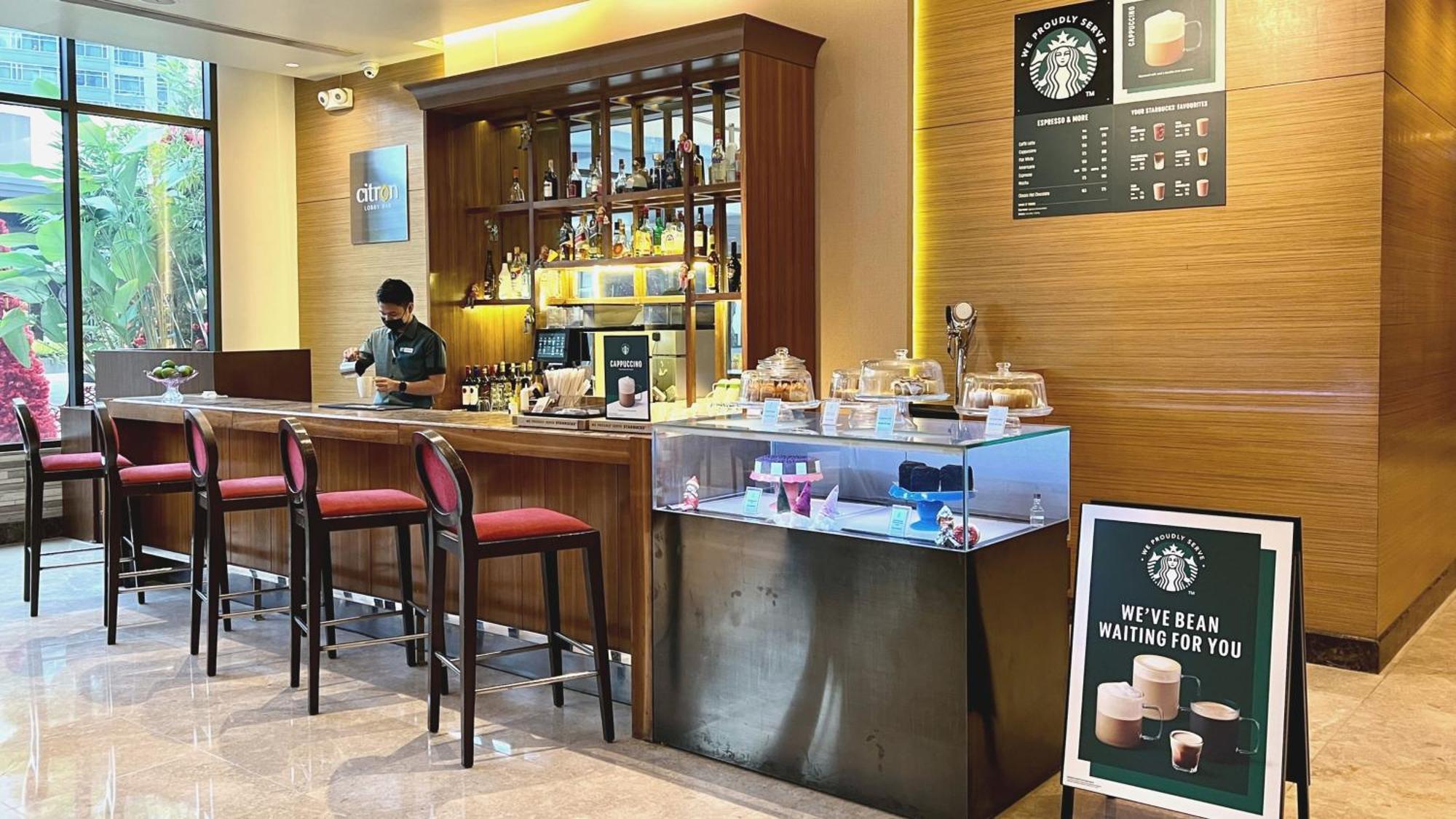Holiday Inn & Suites Makati By Ihg Makati City Eksteriør bilde Starbucks in Hong Kong